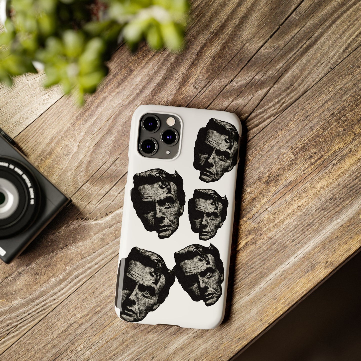 Artistic Slim Phone Cases with Unique Face Design, Trendy Accessories, Gift for Art Lovers, Stylish Phone Covers, Modern Tech [...]