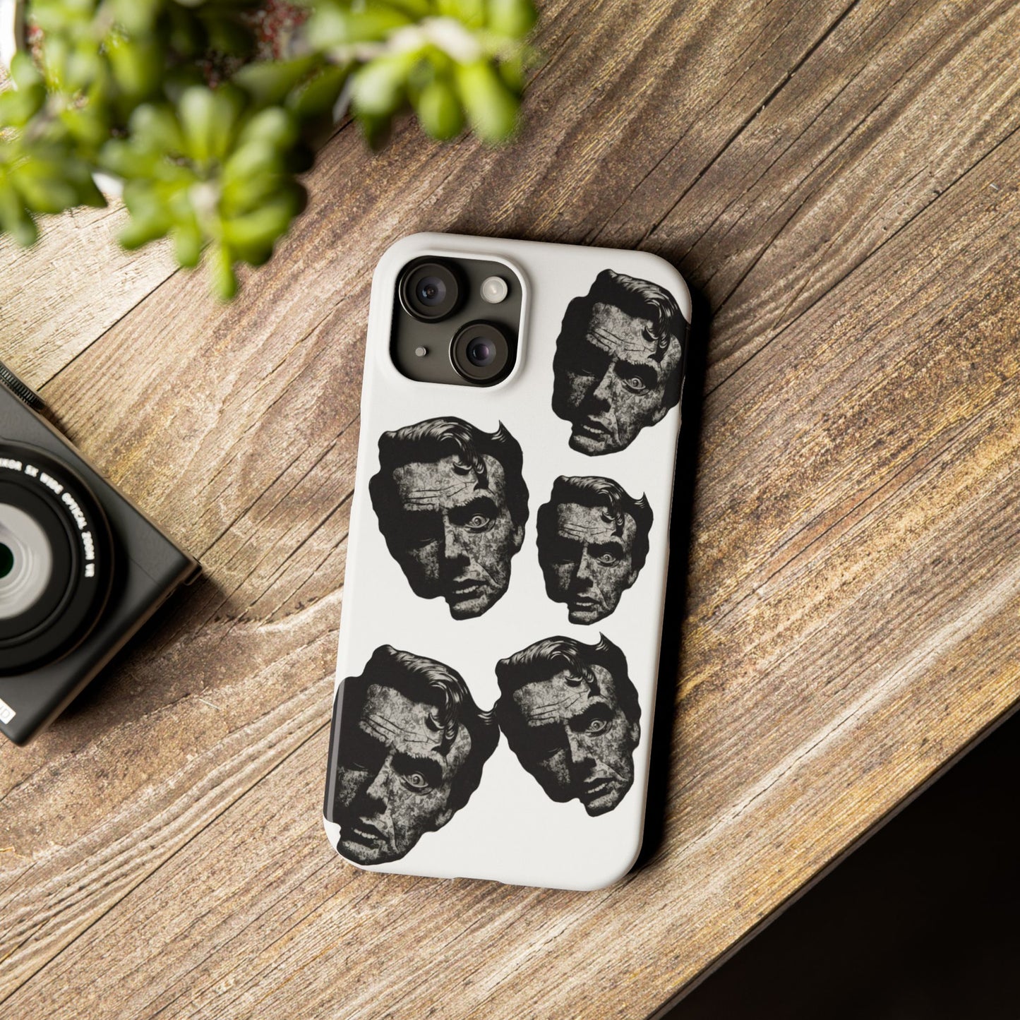 Artistic Slim Phone Cases with Unique Face Design, Trendy Accessories, Gift for Art Lovers, Stylish Phone Covers, Modern Tech [...]